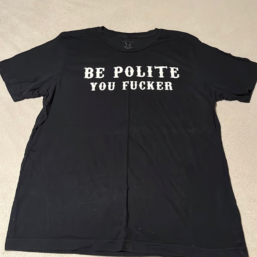 Black graphic tee. Super soft. “Be Polite You F*cker”